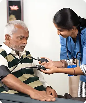 Professional home nurse providing patient care at home in Chennai